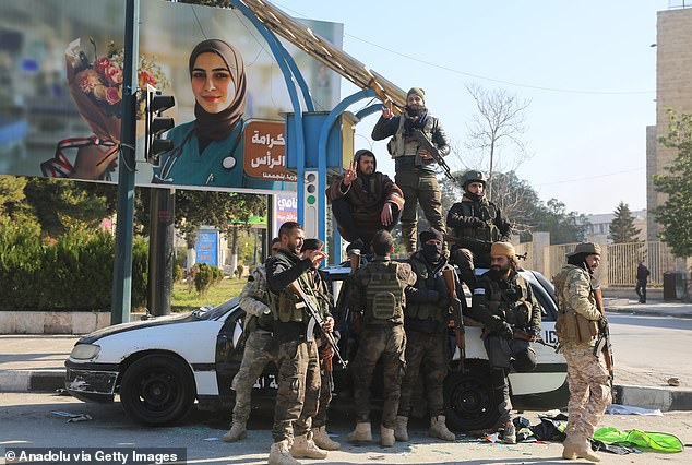 Armed groups opposing the Assad regime seizing control of Aleppo on November 30, 2024