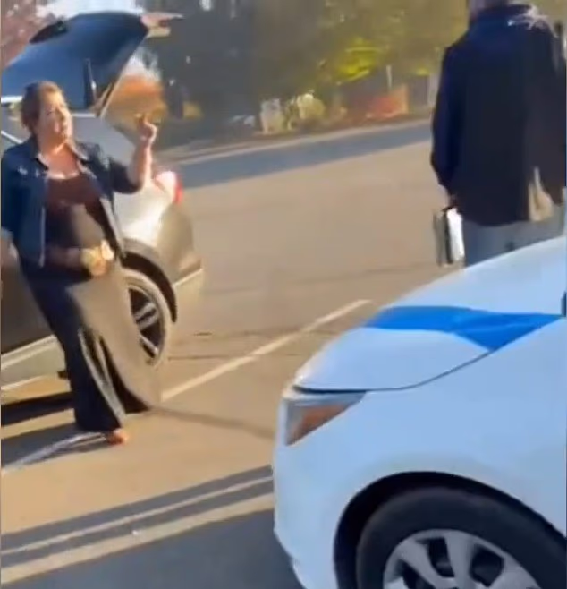 She repeatedly told the man to 'Go back to your country' as they two of them went back and forth