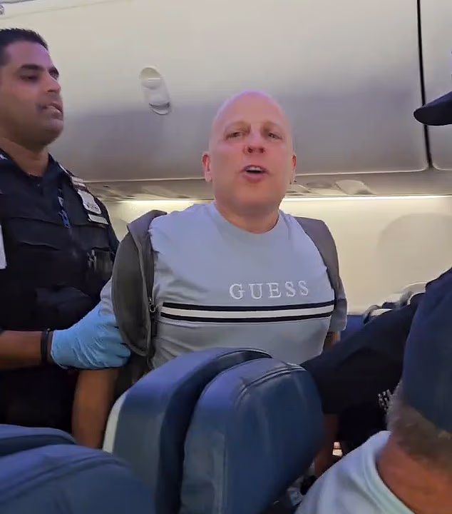 The man appeared to be intoxicated and went on a racist, expletive-filled rant before he was arrested and charged with assault and disorderly conduct