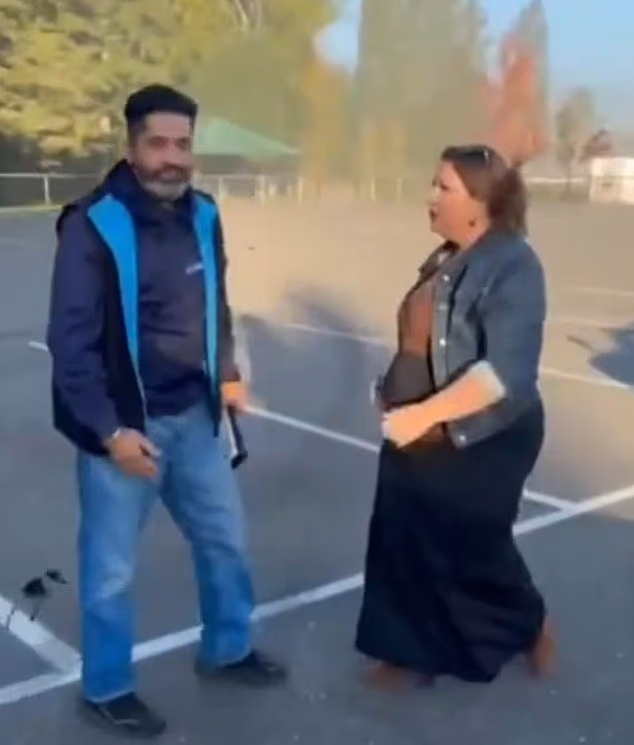 It is unclear exactly what the dispute was about, but according to their interaction, the woman appeared to be upset with him for parking his car 'illegally' across multiple spots in the seemingly empty lot