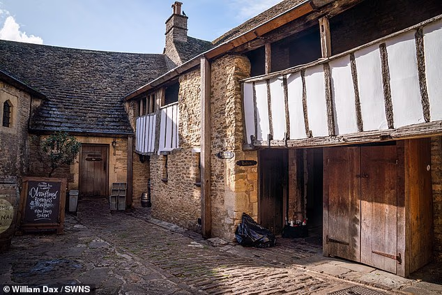 Dr James Wright said that pub's stone and timber show that the building has been in 'continuous' service for over 600 years