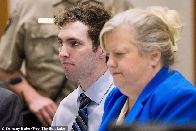 Tyler Robinson, who is accused of fatally shooting Charlie Kirk, sits beside defense attorney Kathryn Nester