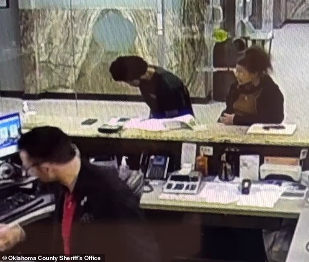 Moore tried to obtain ownership of the sprawling 14,000-square-foot home by filing fraudulent deed documents at the Oklahoma County Clerk's Office. Surveillance footage shows Moore attempting to file the paperwork with courthouse staff