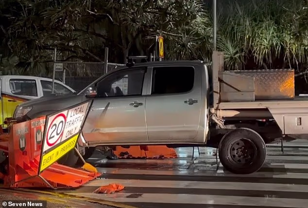 Mayhem outside the Gold Coast 500 as ute 'deliberately' rams into barrier as cops swoop on driver metres from major race attended by families