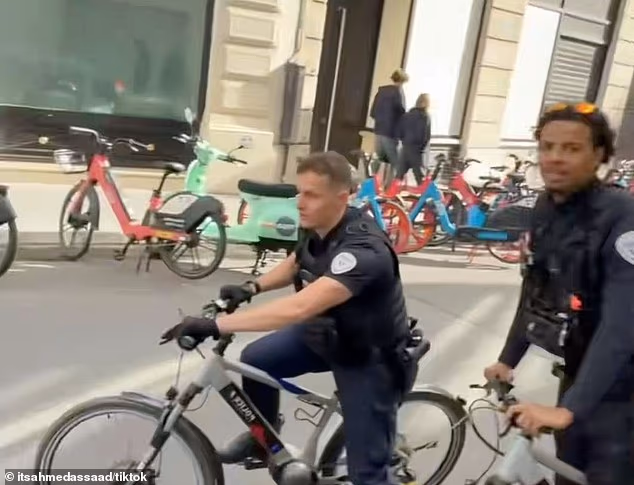 The video ends with the officers appearing to ride off without further incident