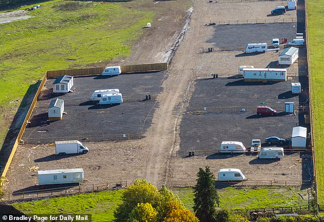 Hart District Council has served an injunction on the development, but it is understood that people are continuing to live in the caravans on the site