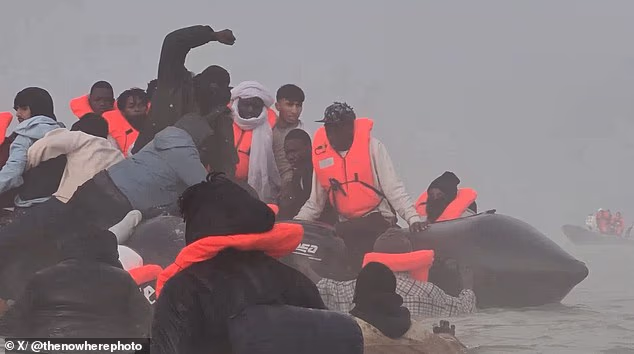 Migrants trying to illegally enter the UK on small boats have broken out into violence as they're caught desperately attacking each other for a space on board