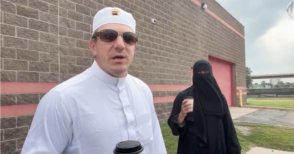 Undercover journalist James O'Keefe, left, went viral for exposing Minnesota's system that allows a voter to "vouch" for up to eight unregistered people to allow them to cast ballots - even if they're unrecognizable in austere Muslim face coverings, as his companion, Cam Higby, was. Now, the state has charged the journalists with felonies for their report.