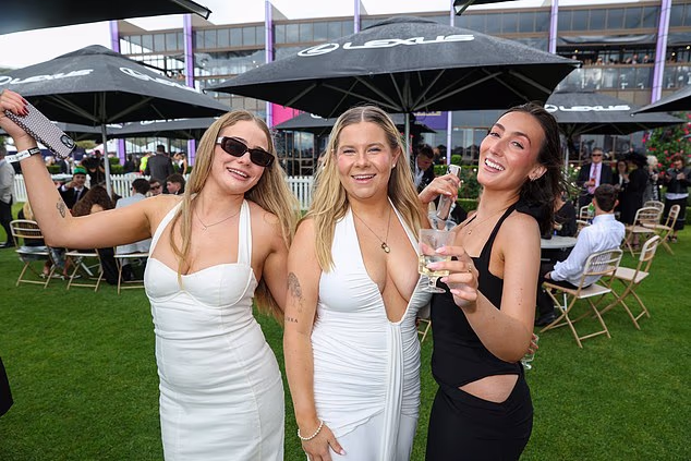 Dressing up is part of the fun of going to the races with your friends