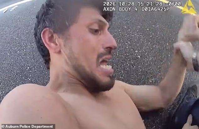Bodycam footage from the officer sees Valles struggling with Bryant in the middle of the road