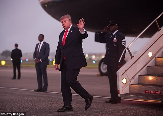 Albro claimed she did not own a Glock, disliked guns and, despite her dislike of Trump, had never intended to shoot anyone, according to court documents (pictured: Trump arriving in Daytona Beach on Friday)