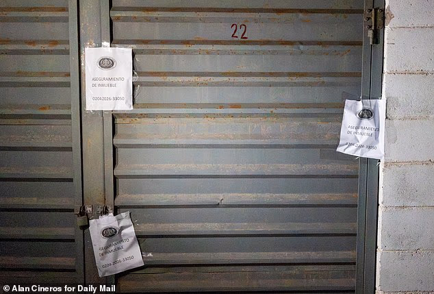 After the raid, the locker was covered with Guardia Nacional signs saying its contents had been seized by police