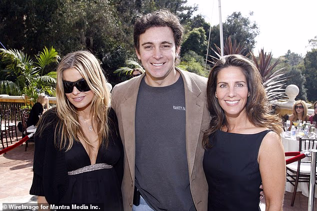 Mark and Jane Fields (center and right, with model Carmen Electra) are suing the exclusive Utah ranch where they live for sexist behavior